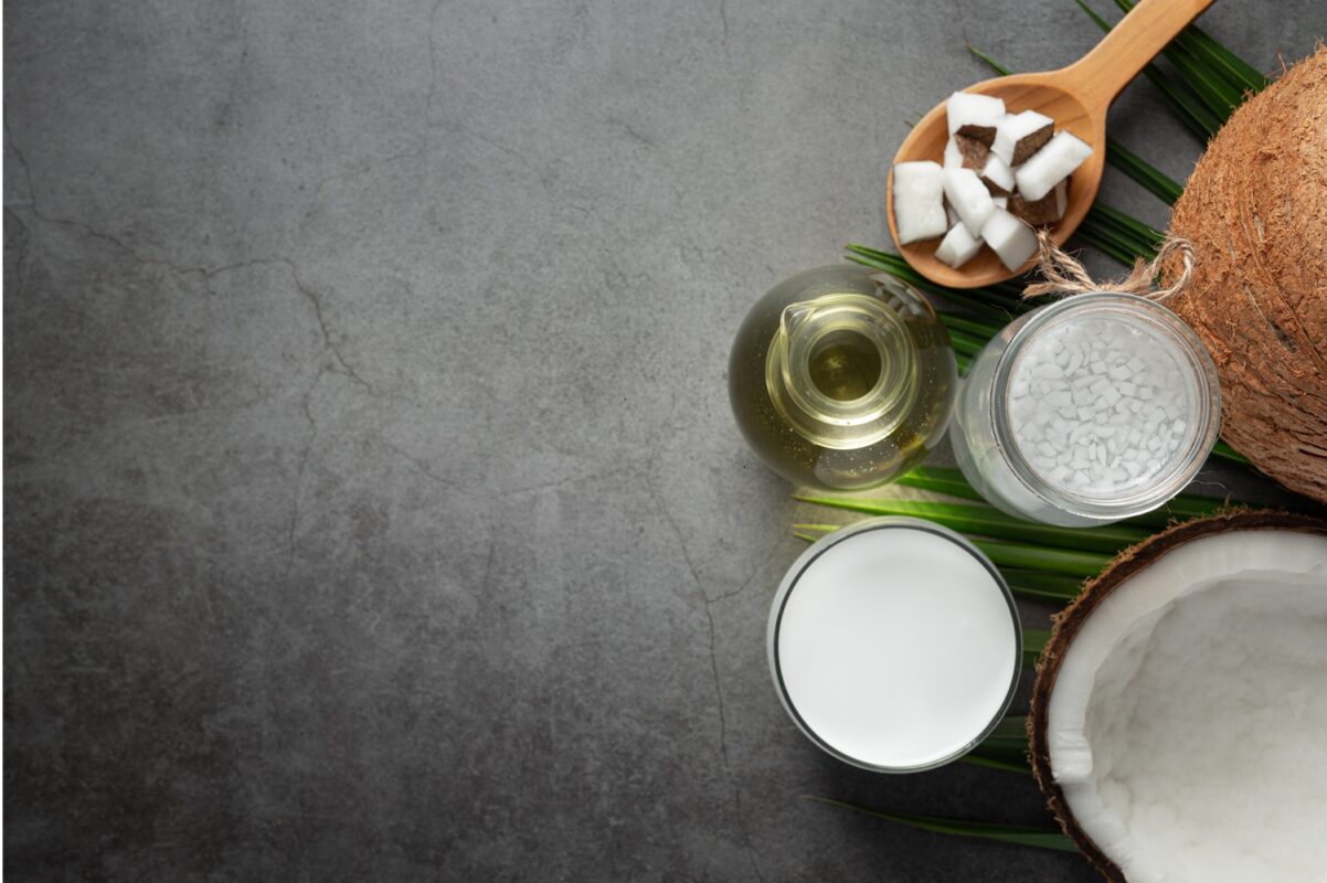 various types products from coconut put on dark floor